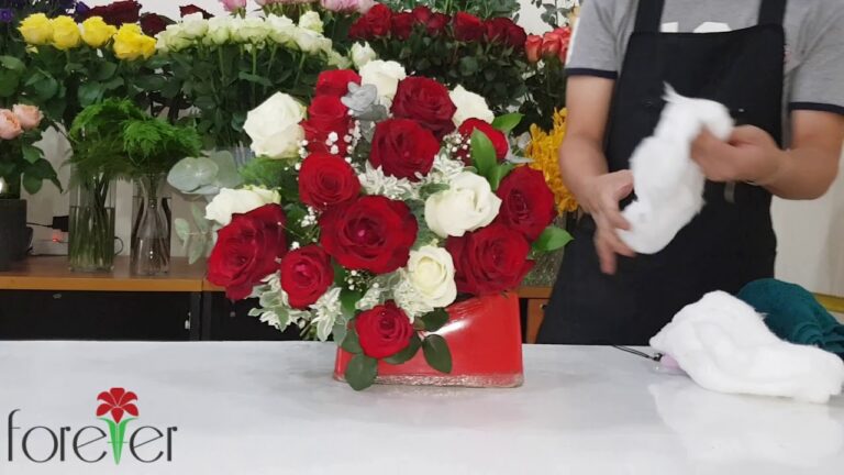 red and white bouquet of roses